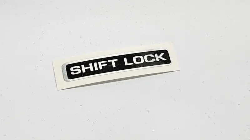 Legacy/Impreza Automatic Shift Lock Sticker 1